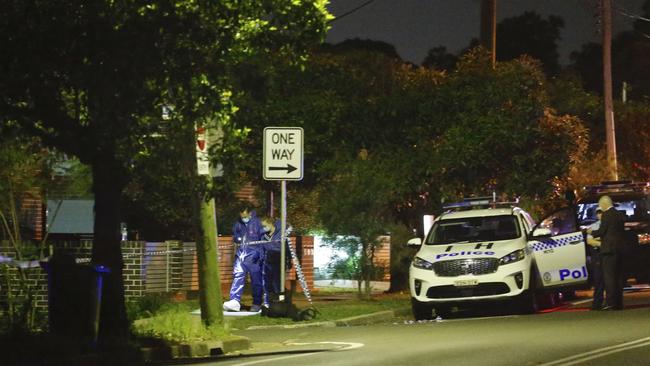 Forensic officers at a crime scene on Wentworth Ave Toongabbie Picture: Steve Tyson