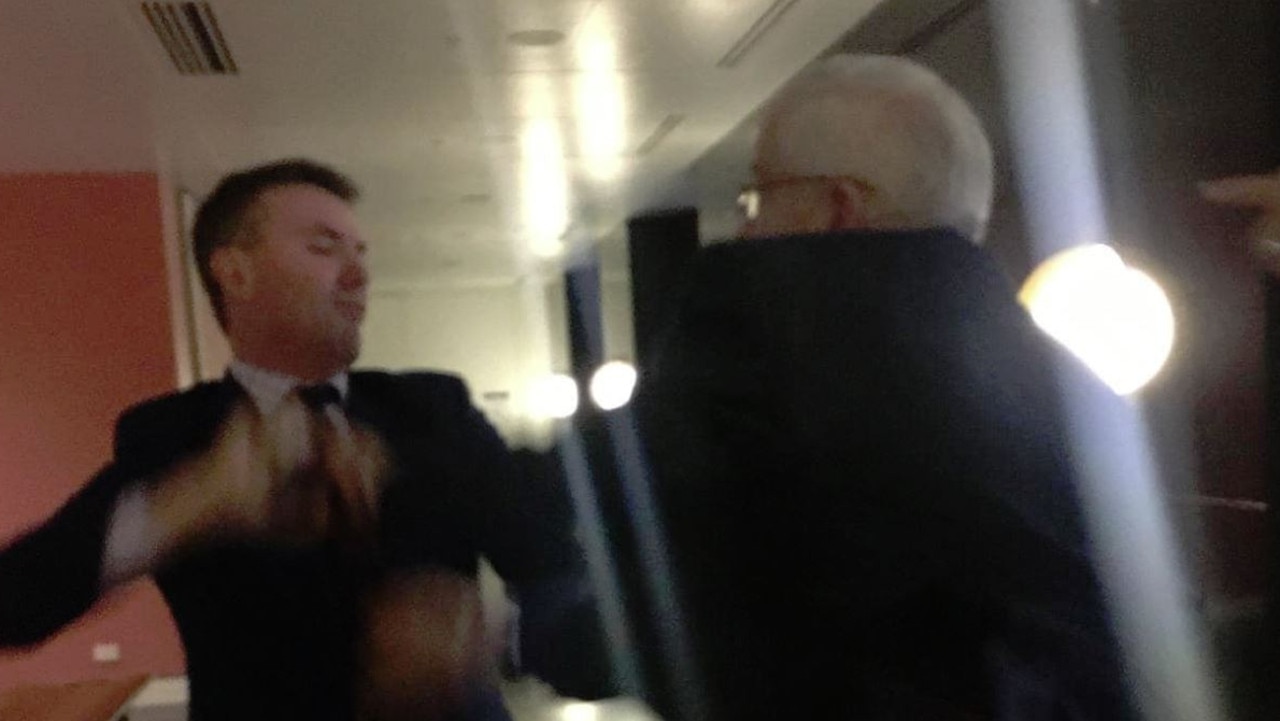 Senator Brian Burston and One Nation adviser James Ashby came to blows.