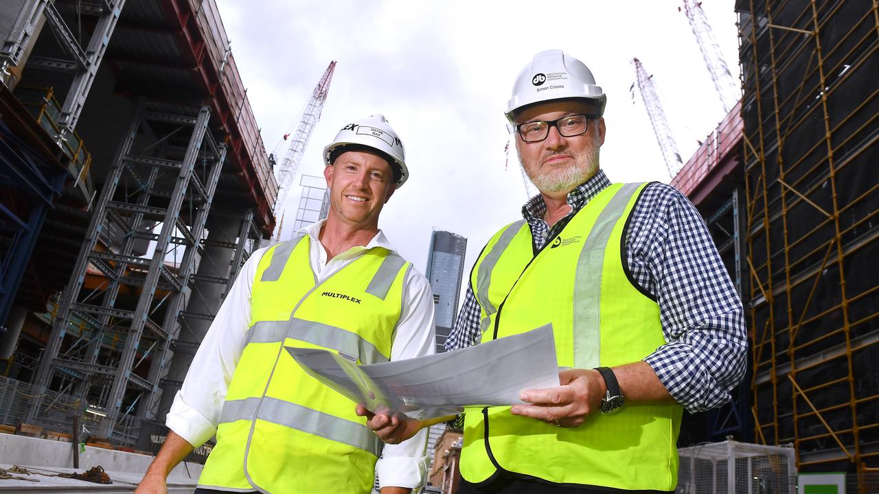 Simon Crooks, project director of Destination Brisbane Consortium with Multiplex project director Dayne May on the Queens Wharf site. Picture: John Gass
