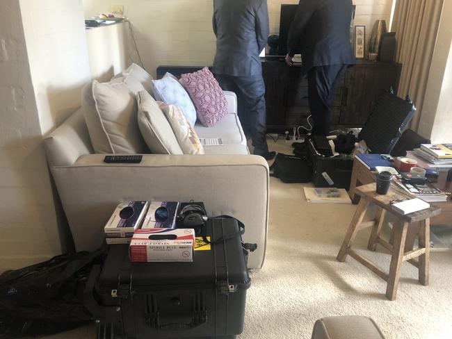 Federal police going through Annika’s home. Picture: Supplied