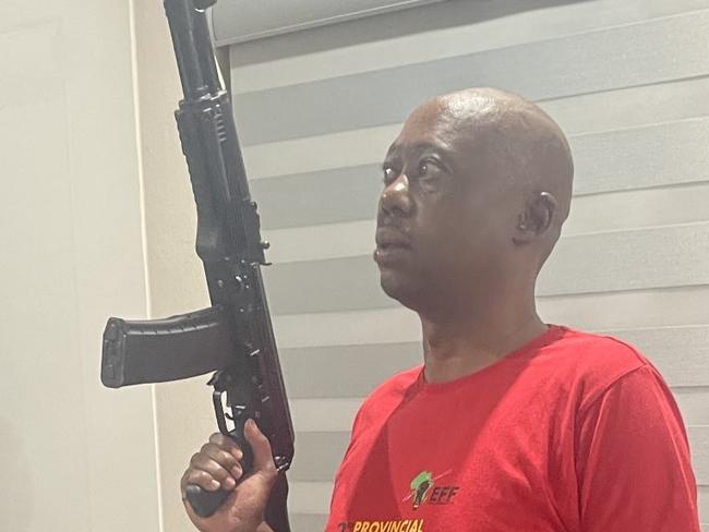 Collen Sedibe from South Africa's Economic Freedom Fighters (EFF) posing with a rifle and the caption 'by all means necessary' ahead of the EFF's national shutdown on March 20, 2023. Picture: @collensedibe/Twitter