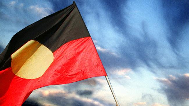 EMBARGO FOR TWAM 31 OCT 2020 FEE APPLIESAn Aboriginal flag, 3 December 1997.GREG NEWINGTON / Channel Nine Publications