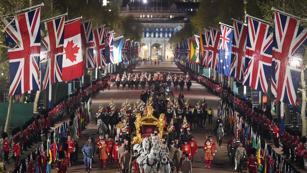 Photos of a night-time rehearsal in central London for the Coronation of King Charles III. Picture: James Manning.