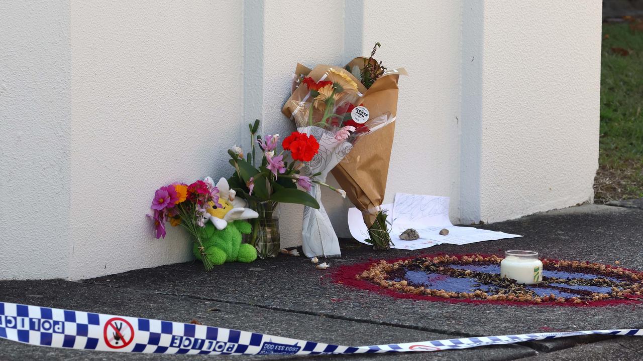 Flowers and a peace symbol were also left. Picture: NewsWire/Tertius Pickard