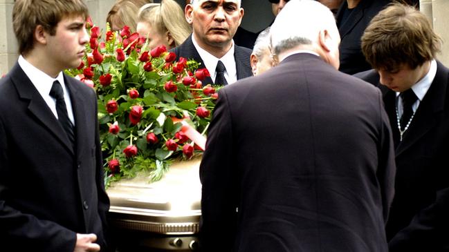 In true gangster style Carl Williams was buried in a gold coffin, and his family squabbled over who paid for it. Picture: AAP