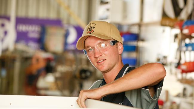 Apprentice carpenter Matt Ellison at work at Territory business Invision NT. Invision’s owner Deanne Claydon says that the way the Government’s Home Improvement Scheme is being implemented is proving to be a ‘huge problem’ for her business and customers. Picture Glenn Campbell