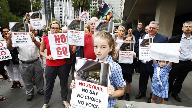 Residents protest against Sky Rail outside the State Government offices. Picture: Paul Loughnan