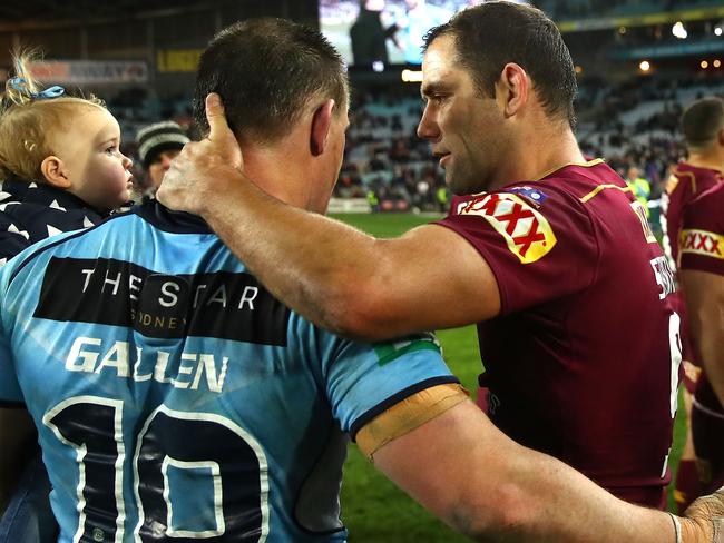 Cameron Smith and Paul Gallen embrace after game three.