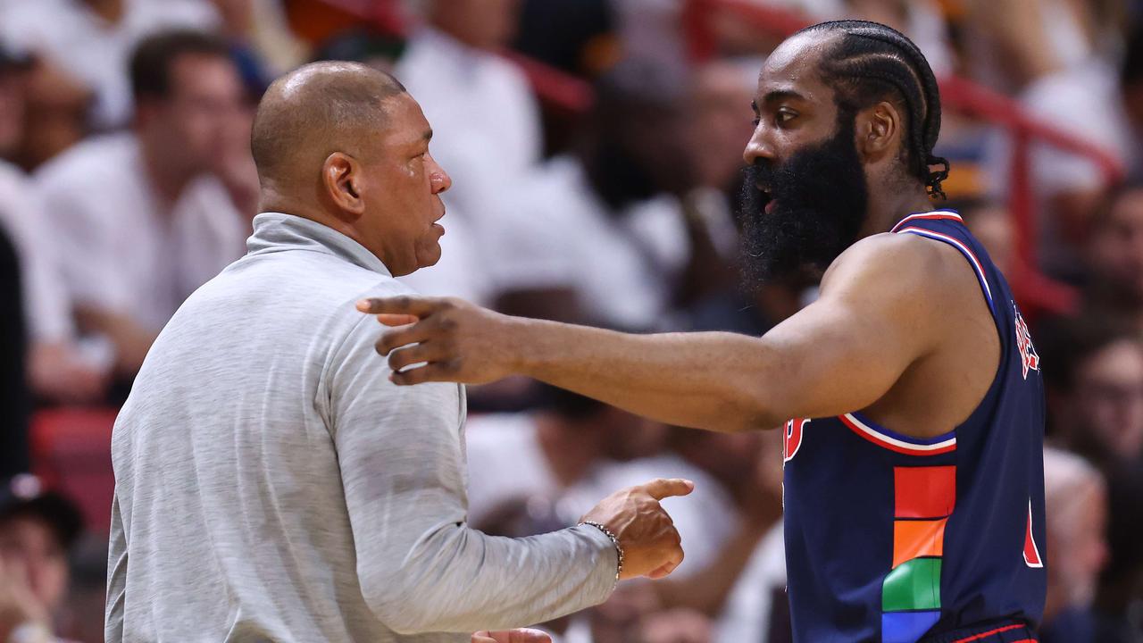 James Harden talks with head coach Doc Rivers. Photo: Michael Reaves/Getty Images/AFP