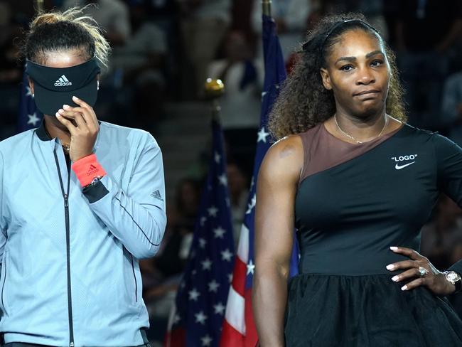 Serena Williams and US Open champ Naomi Osaka during the awkward presentation ceremony. Picture: AFP