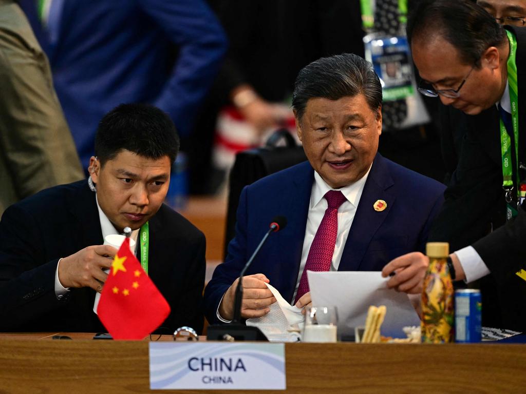 China's President Xi Jinping (C) attends the first day of the G20 Summit in Rio de Janeiro, Brazil. Picture: AFP