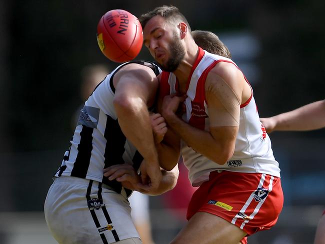 Kelsey Currie puts his body on the line for Olinda Ferny Creek. Picture: Andy Brownbill