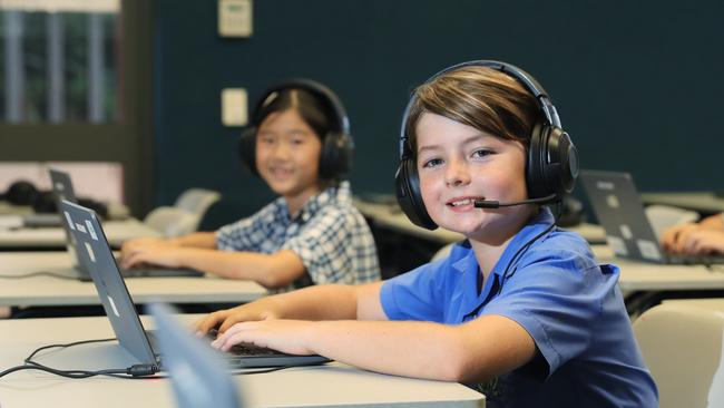 Grade 3,5,7 and 9 students have begun the annual NAPLAN tests, which some Cairns schools are sitting completely online. Peace Lutheran College Grade 5 student Myles Dever, 10, goes hi-tech for this year's test. Picture: Brendan Radke