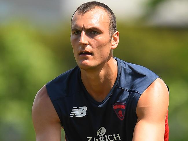 MELBOURNE, AUSTRALIA - NOVEMBER 19: Braydon Preuss kicks during a Melbourne Demons AFL training session at Gosch's Paddock on November 19, 2018 in Melbourne, Australia. (Photo by Quinn Rooney/Getty Images)