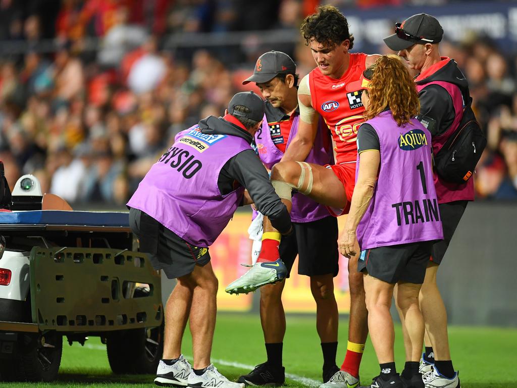 Wil Powell required assistance after injuring his ankle. Picture: Albert Perez / Getty Images