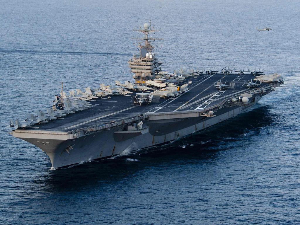 America has deployed additional military resources to the Middle East, including aircraft carrier the USS Abraham Lincoln. Picture: AFP