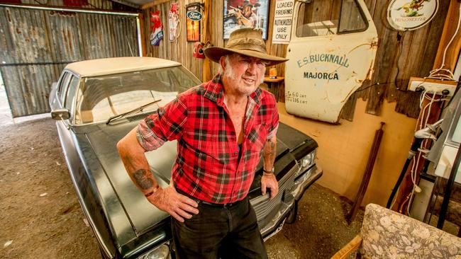 Chris inside his museum that includes a car used in the Wolf Creek TV show. Picture: Tim Carrafa