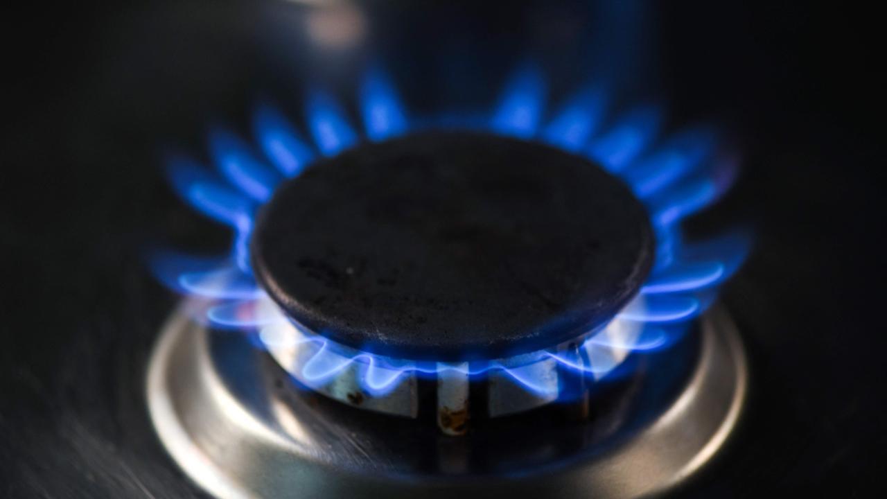 A new report calls for gas to be phased out of Australian homes and businesses. (Photo by Ina Fassbender / AFP)