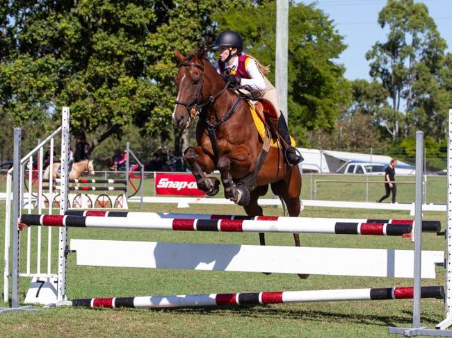 Bundaberg's Lorelei Bertoli and See That at the 2023 PQC State Showjumping Championships.