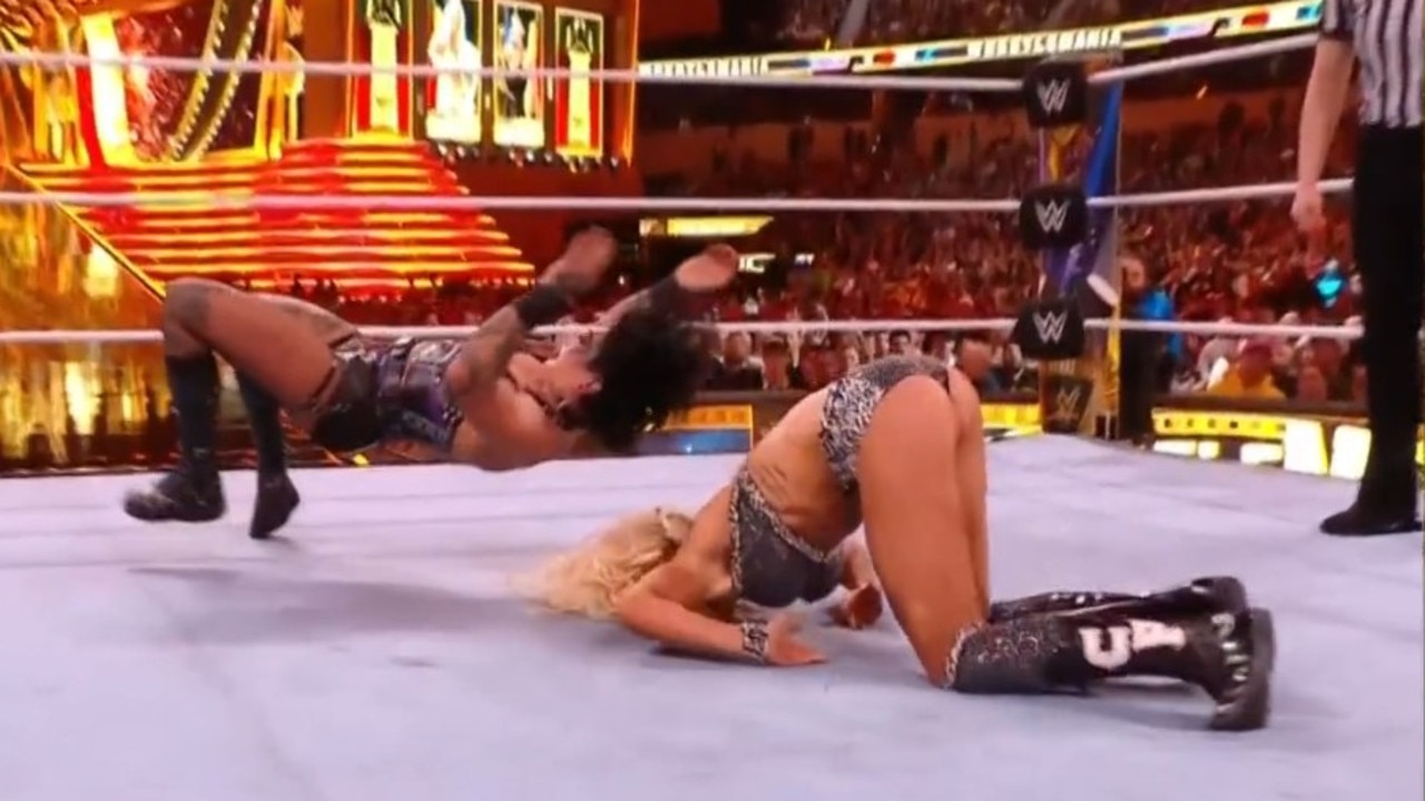 Rhea Ripley throws Charlotte Flair on her face. Photo: Fox Sports.