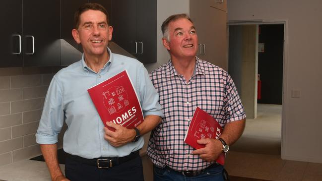 Deputy Premier Cameron Dick and Resources Minister Scott Stewart inspect one of the units in Pimlico that had been built on government owned land. Picture: Evan Morgan