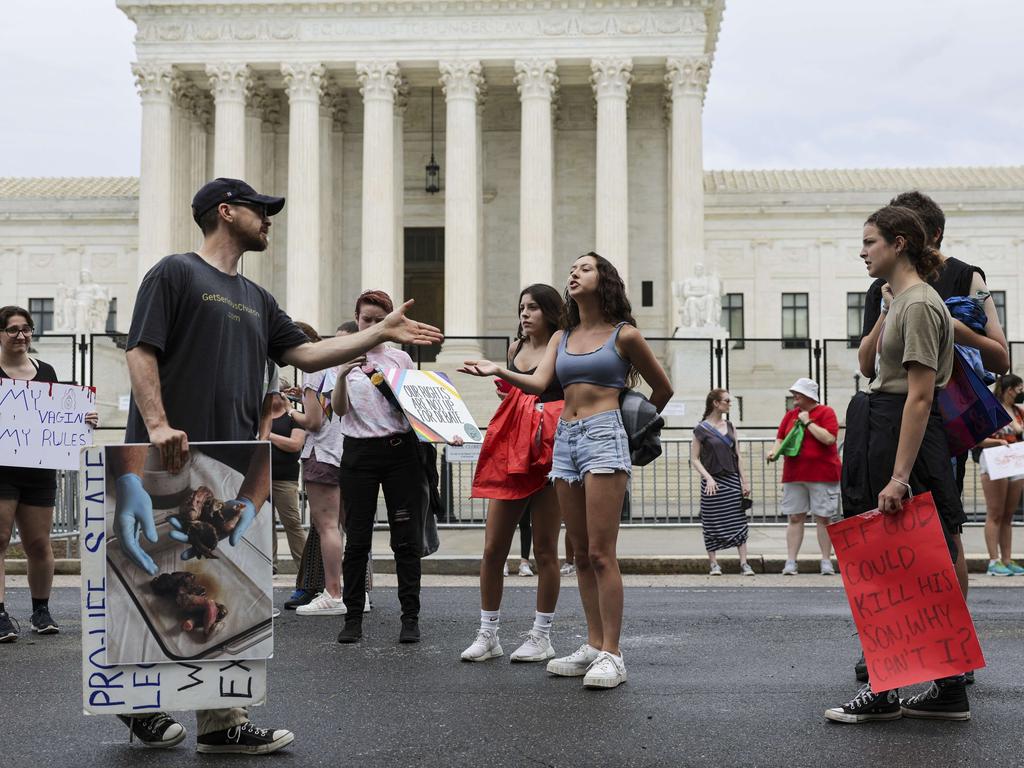 Pro-choice and anti-abortion activists argue. Picture: Kevin Dietsch/Getty/AFP