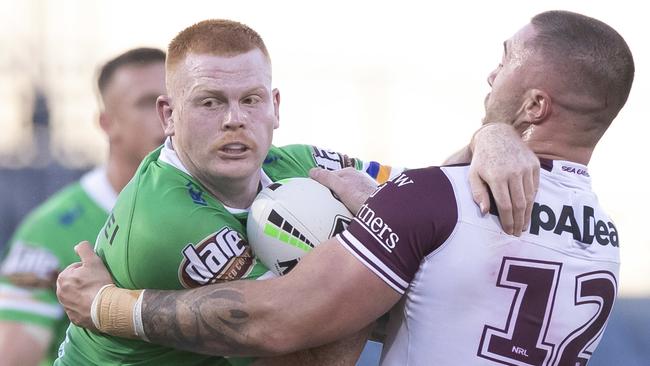 Corey Horsburgh of the Raiders tackled by Curtis Sironen of the Sea Eagles during the Round 6 NRL match between the Canberra Raiders and the Manly Warringah Sea Eagles at Campbelltown Stadium in Sydney, Sunday, June 21, 2020. (AAP Image/Craig Golding) NO ARCHIVING, EDITORIAL USE ONLY