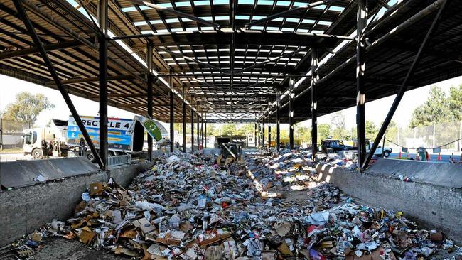 Ipswich Waste Services team leader Michael Joned empties his load at Riverview. Picture: Rob Williams