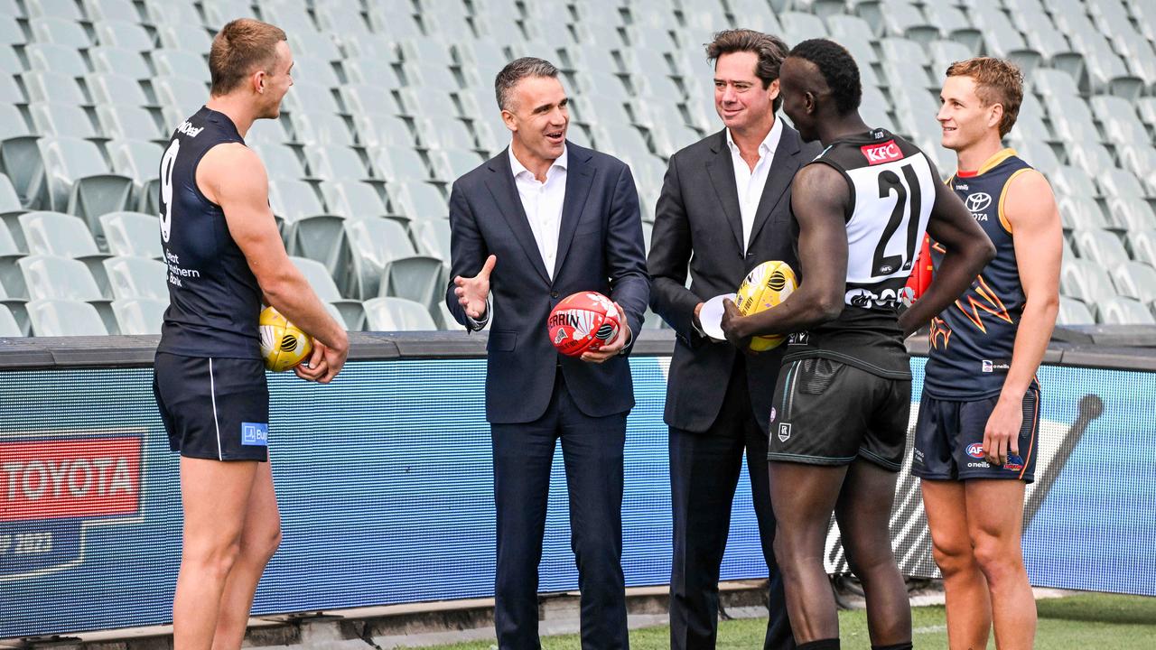 Carlton captain Patrick Cripps, South Australian Premier Peter Malinauskas, AFL CEO Gillon McLachlan, Port Adelaide player Aliir Aliir and Adelaide Crows captain Jordan Dawson at Adelaide Oval in the lead up to Gather Round Picture: NCA NewsWire / Brenton Edwards