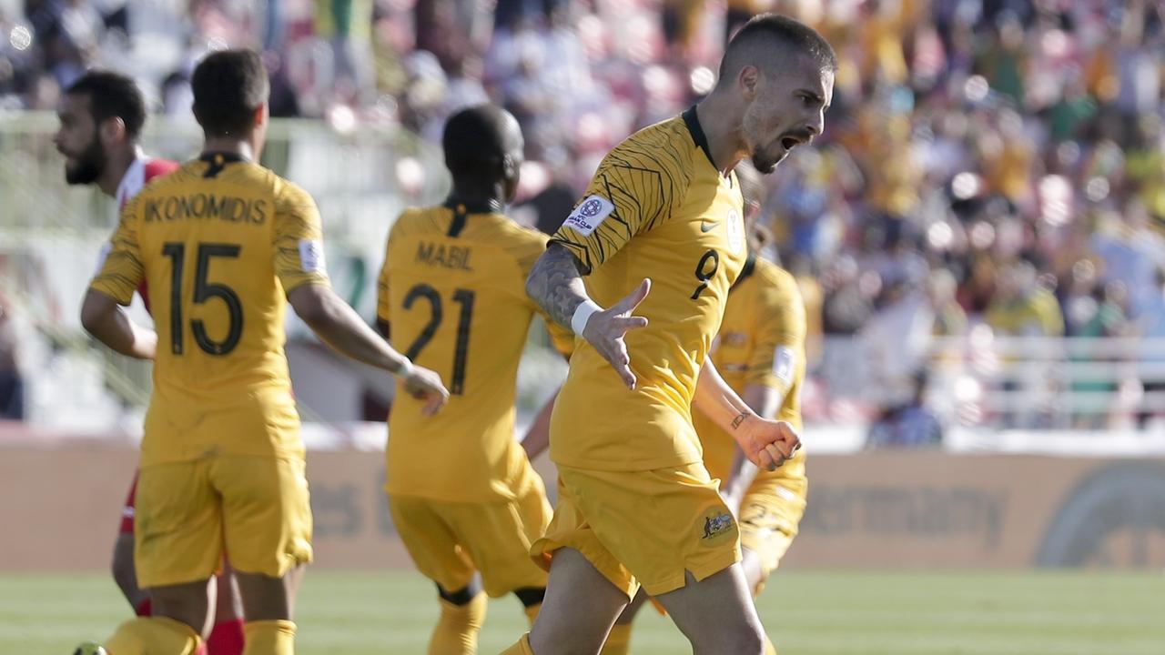 Australia's forward Jamie Maclaren celebrates. (AP Photo/Hassan Ammar)