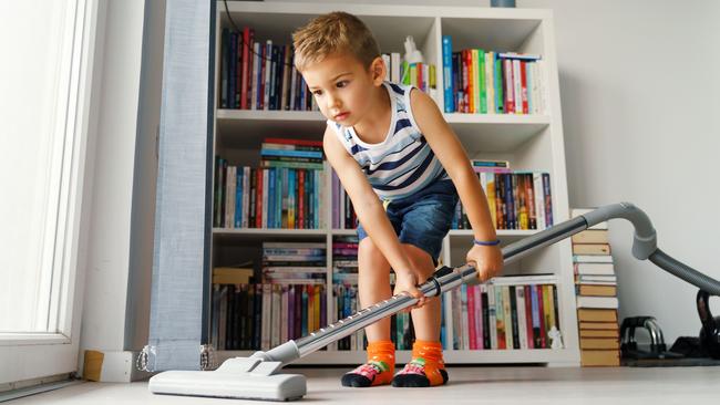 Help children learn their chores by doing them together the first time.