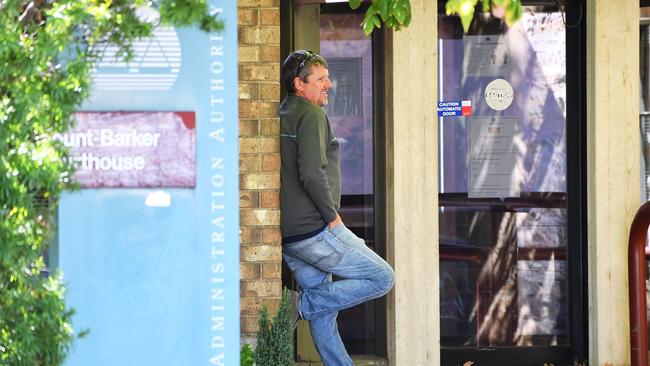 Horse trainer Leslie John Bajszi waits outside the Mount Barker courthouse. Photo: Mark Brake / AAP.