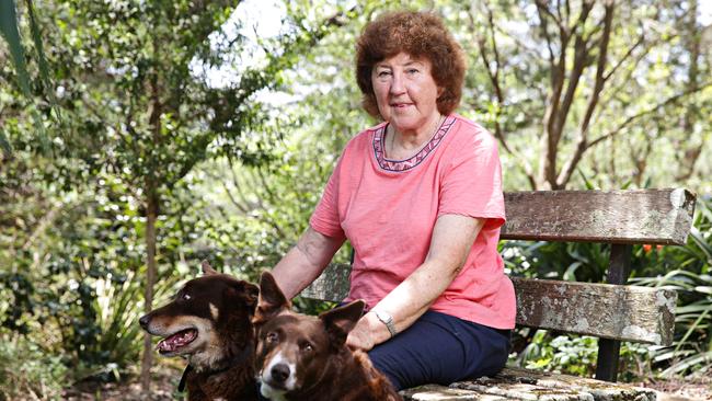 Ellen Saville with her dogs Red and Ruby at her home in Alpine in the Southern Highlands. Picture: Adam Yip