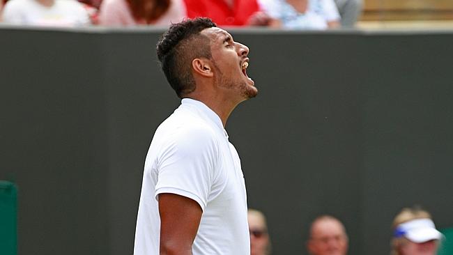 Nick Kyrgios screams during his first-round match at Wimbledon.
