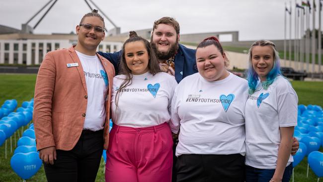 Luke Mitchell behind fellow Youth Insearch activists Joshua Camilleri, Kate Hornick, Courtney Seach, and Nelani Botha on the front lawn of Parliament House, Canberra. Photo: Supplied