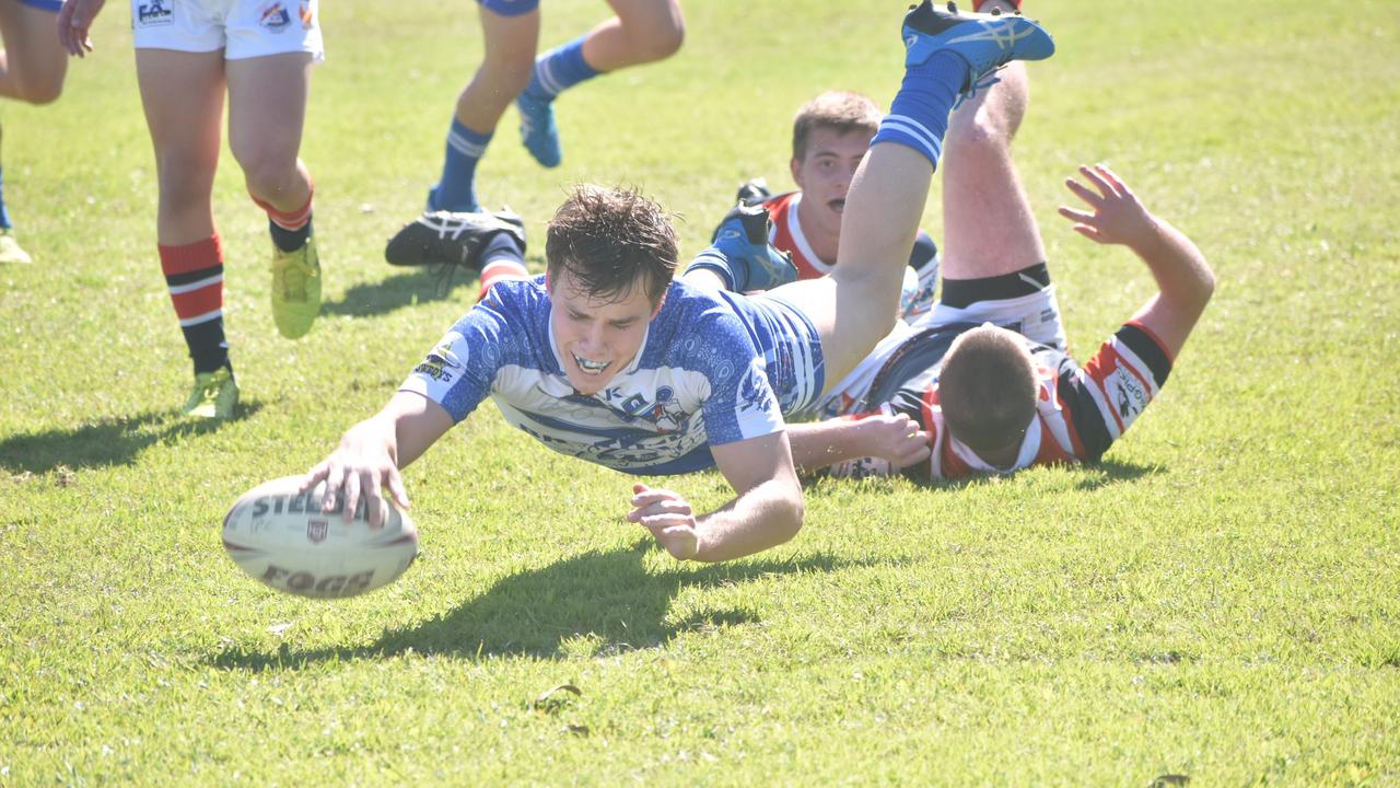 Sean Bourke scores a try for Ignatius Park against St Patrick's College in the Aaron Payne Cup in Mackay, 20 July 2021. Picture: Matthew Forrest