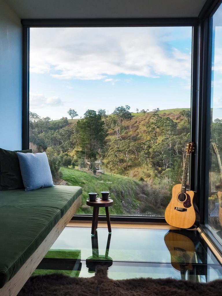 Glass floors overlook the bush. Picture: Stayz