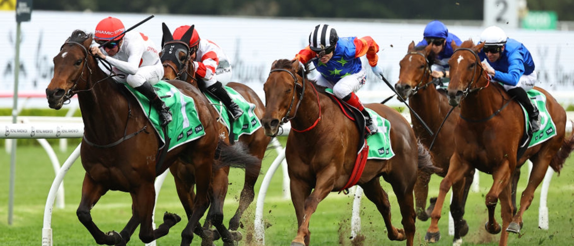 Bella Nipotina (black and white striped cap) chases home I Am Me in the Concorde Stakes at Randwick on Saturday. Photo: Jeremy Ng/Getty Images.