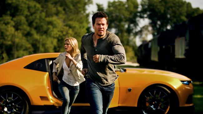 Wahlberg in front of the car Bumblebee that will score its own movie next year.