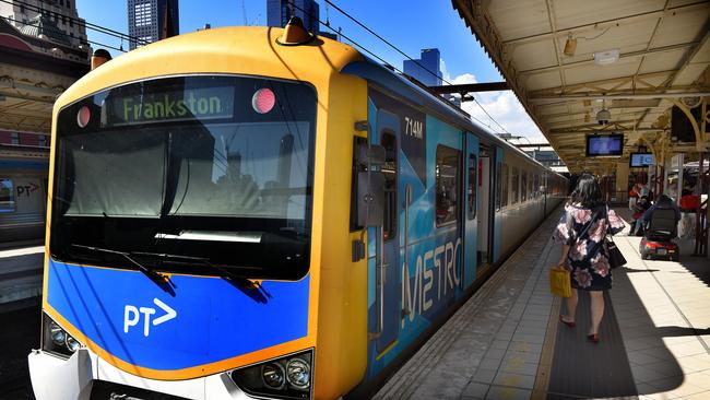 Victoria’s public transport system is still handling 200,000 trips each day. Picture: Tony Gough