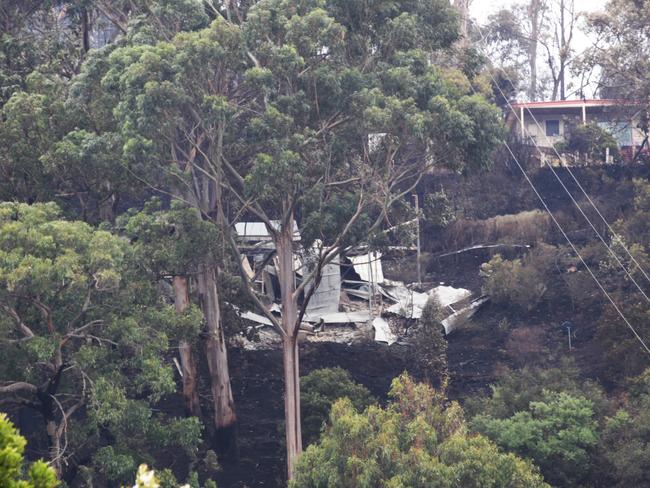 Houses that have been lost in bushfires at Separation Creek on the Great Ocean Road in Victoria. Saturday, Dec 26. 2015. Picture: David Crosling