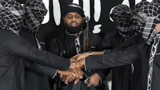 An Islamic State image purporting to show Sri Lankan attack leader Zahran Hashmi, centre, and fellow suicide bombers.