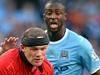 Manchester City's Serbian defender Matija Nastasic (L) and Manchester City's Ivorian defender Yaya Toure (R) tackle Manchest...