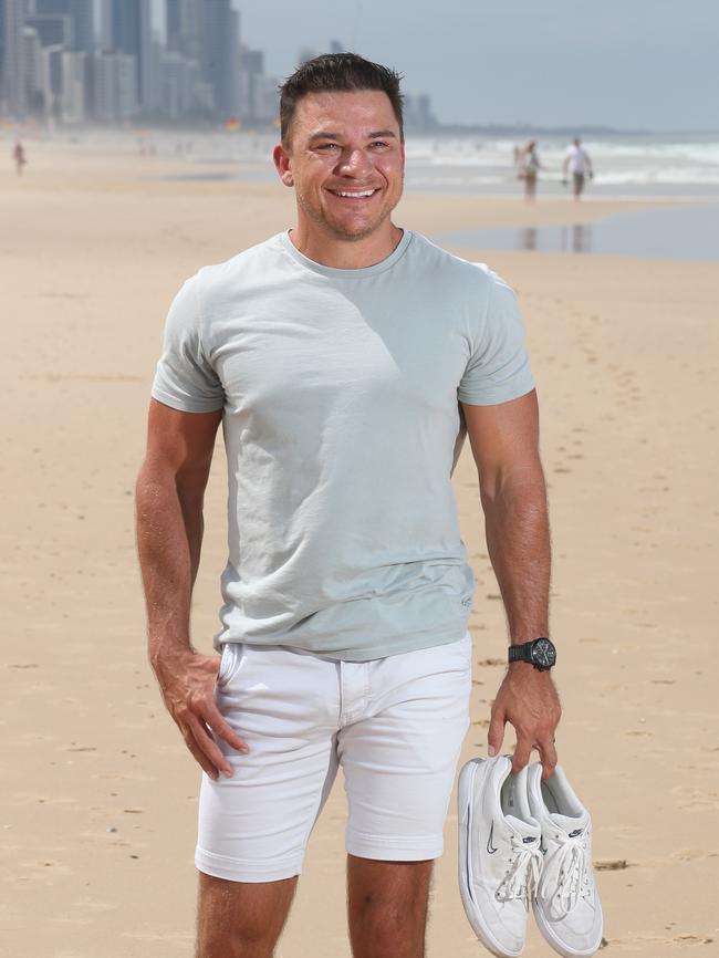 Dan enjoys the beach and also enjoys being passive aggressive to Sandy. Picture Glenn Hampson