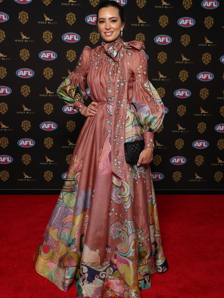 Lauren O’Shannassy, wife of retired Fremantle star Matthew Pavlich, who wore a pink printed gown with a pussybow tie. Picture: Paul Kane/Getty Images