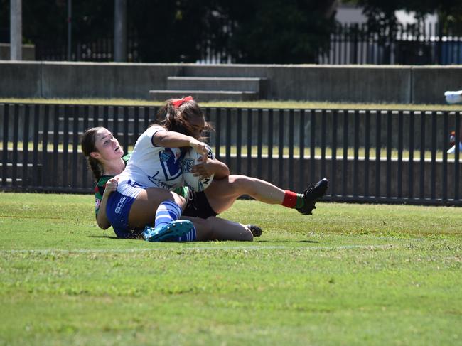 Litia Fusi is brought down by Georgie Coote. Picture: Sean Teuma/NewsLocal