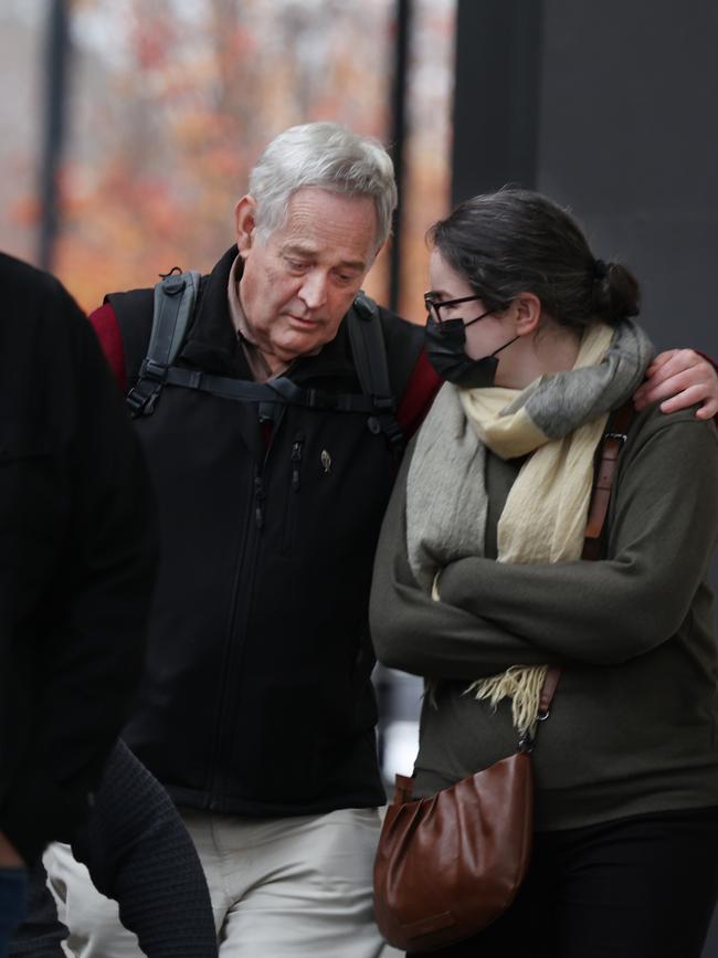 Meal survivor Ian Wilkinson leaves with one of his daughters at court in Morwell for the Erin Patterson's trial. Picture: NewsWire/ David Crosling