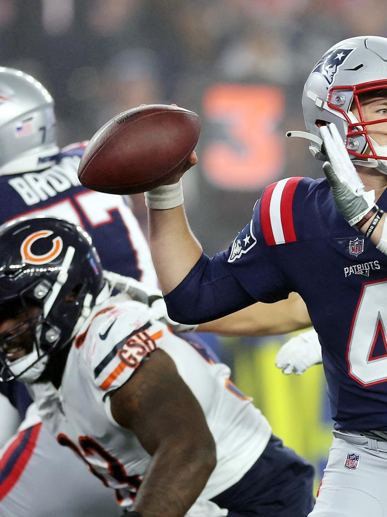 New England Patriots quarterback Mac Jones plays against the Chicago Bears  during the first half of an NFL football game, Monday, Oct. 24, 2022, in  Foxborough, Mass. (AP Photo/Michael Dwyer Stock Photo 