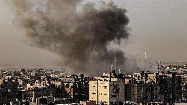 Smoke billows over buildings following Israeli bombardment in Rafah. Picture: AFP.