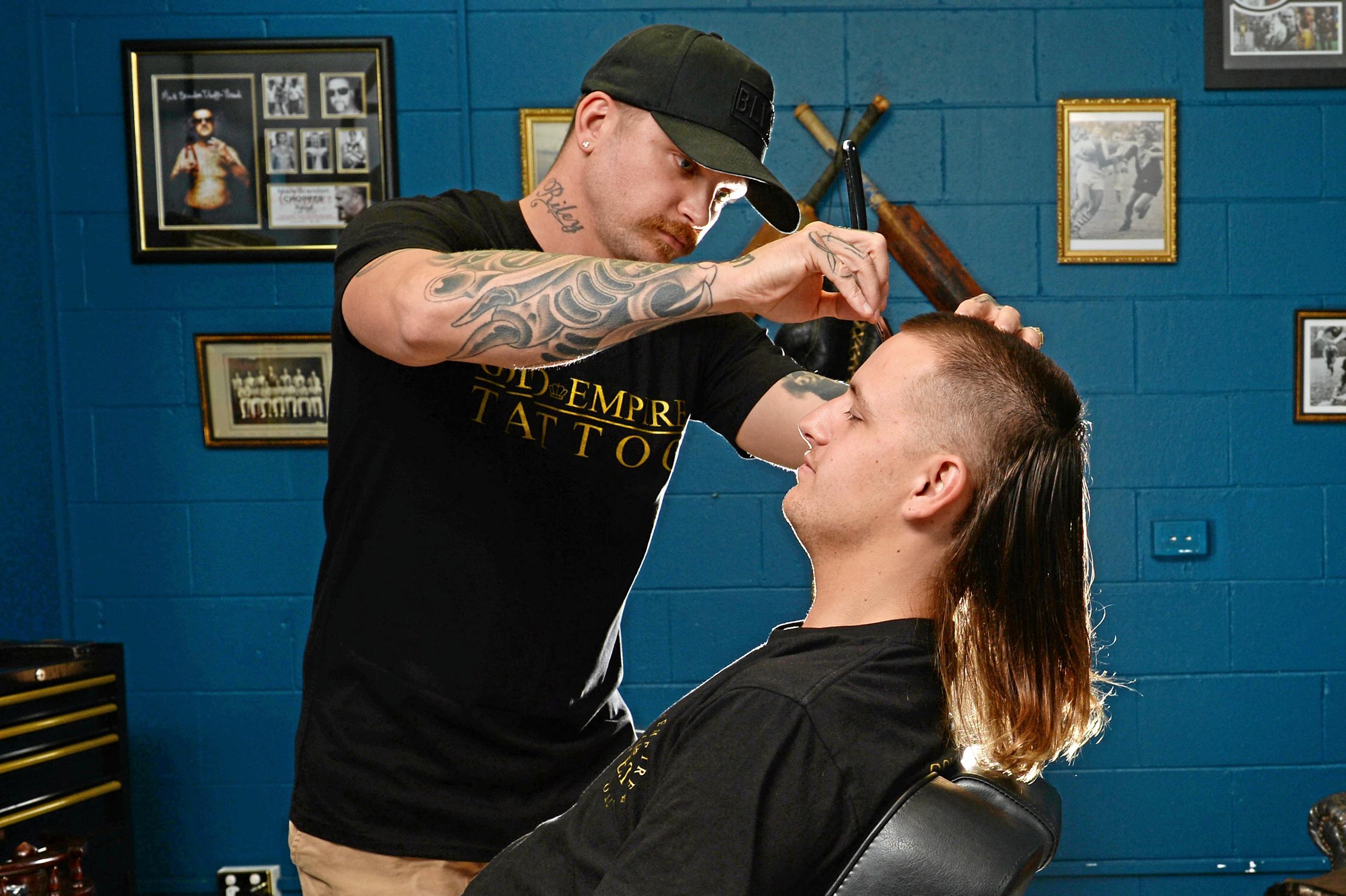 The Mullet is making a comeback in Mackay. Jai Gurr getting his Mullet styled by Andrew Folwell at Gold Empire Tattoo and Hair in Mackay. Picture: Stuart Quinn